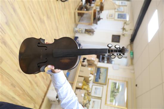 A mid 19th century German violin, bears Nicolas label, cased with a silver mounted bow, back 36cm